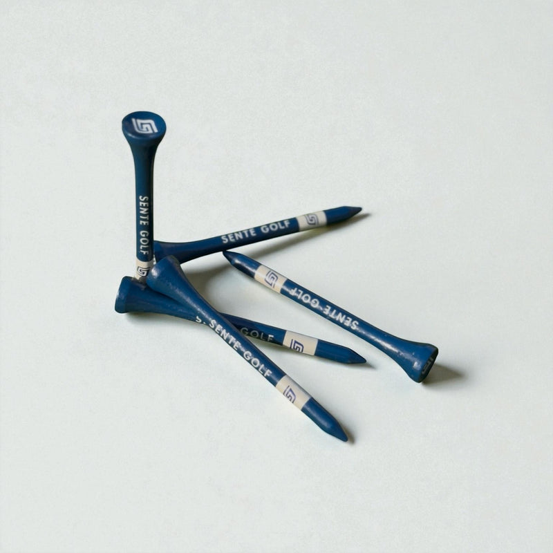 Blue golf tees with 'Sente Golf' branding on a white background